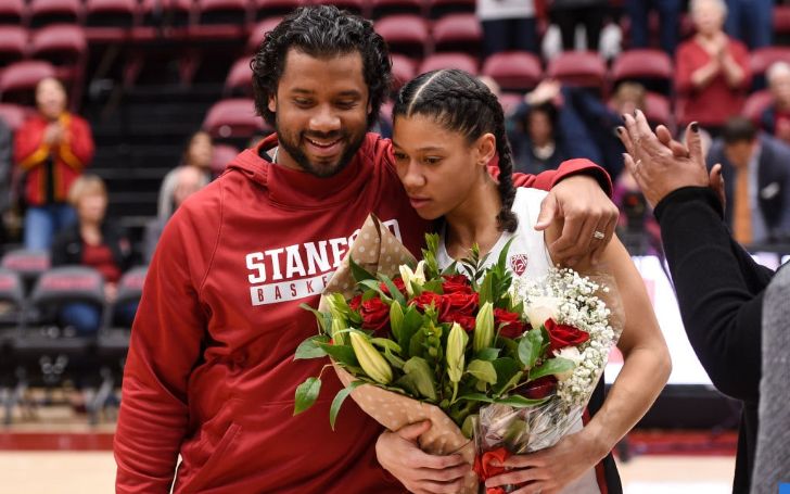 Harrison's brother, Russell, and sister Anna were captured by a camera together.